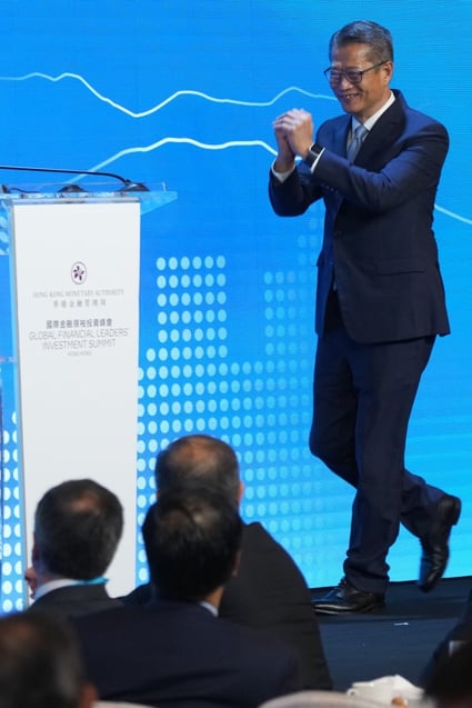 Financial Secretary Paul Chan arrives on stage at the Global Financial Leaders’ Investment Summit, at the Four Seasons Hotel in Central, on November 2. Photo: Sam Tsang