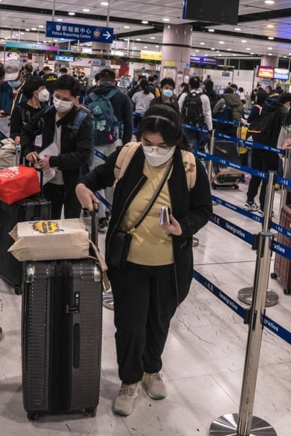 Travellers queue in the border control area at Lok Ma Chau station on January 8, the first day the border with the mainland was reopened for quarantine-free travel. Photo: Bloomberg