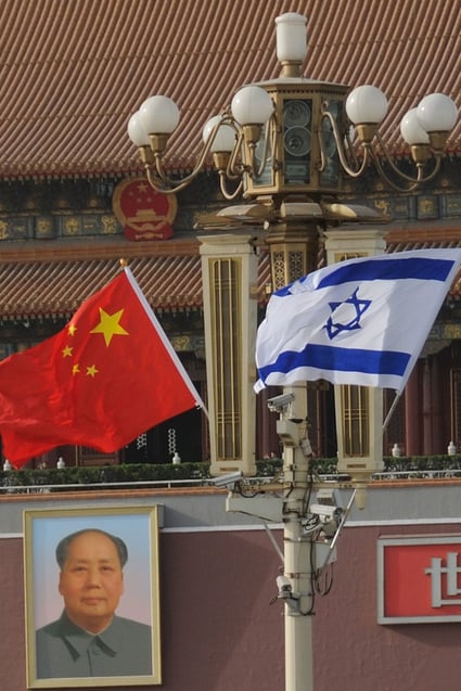 National flags of China and Israel hung at Tiananmen Square in 2014. Photo: Imageinechina