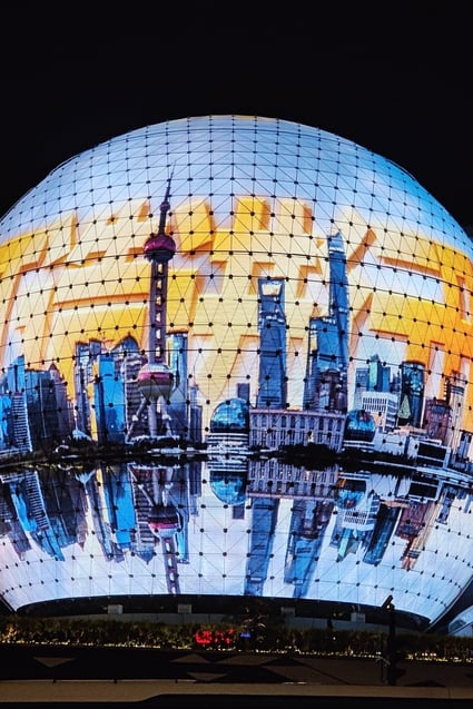 A promotional video for the CIIE is displayed on the world’s first naked-eye 3D spherical screen in Xujiahui Metro City in Shanghai. The expo will be held in the city from November 5 to 10. Photo: Imagine China