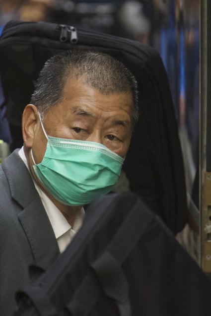 Jimmy Lai leaves Hong Kong’s Court of Final Appeal where the government is arguing against allowing him bail in Hong Kong, Feb. 1, 2021. Photo: AP