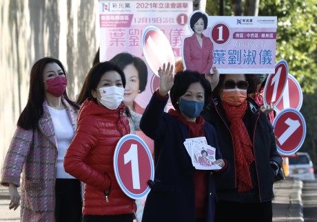 Regina Ip (second from right) and her supporters canvass for votes at The Peak on Friday. Photo: Jonathan Wong