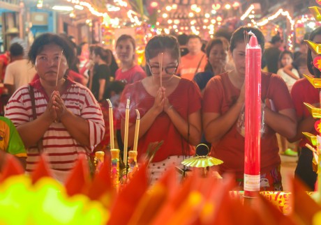 People praying in Thailand in 2016 during the Moon Praying Festival. The Mid-Autumn Festival is celebrated in many different ways outside China. Photo: Shutterstock