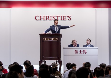 Christie’ auctioneer Rahul Kadakia takes bids at an auction in Hong Kong. 
Photo: Keith Tsuji/Getty Images