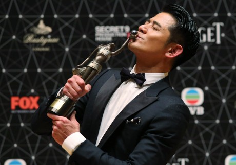Aaron Kwok with the prize for best actor he received at the 35th Hong Kong Film Awards in 2016. Photo: Edward Wong
