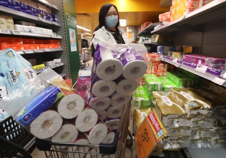 Hongkongers put themselves at risk of contracting the new coronavirus by flocking to buy masks, rice and toilet paper. Photo: Nora Tam