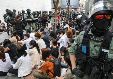 A group of anti-government protestors are detained by the police during a demonstration in Causeway Bay on May 27. Photo: Dickson Lee