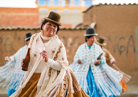 Aymara women in traditional clothing and bowler hats in La Paz, Bolivia. Photo: Shutterstock
