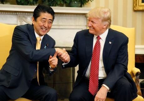 US President Donald Trump shakes hands with then Japanese prime minister Shinzo Abe during their meeting in the White House in Washington in February 2017. Abe’s close personal relationship with Trump failed to temper the president’s actions on matters of importance. Photo: Reuters