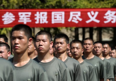 The PLA has increasingly sought more educated recruits, but has had to cast the net wider to conscript the numbers it needs. Photo: Barcroft Media via Getty Images