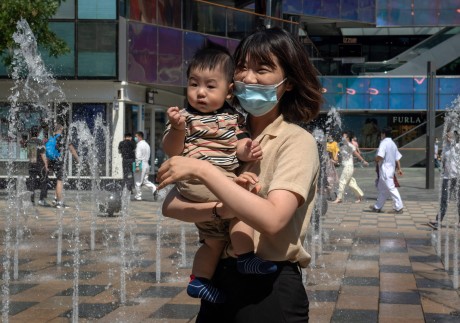 Structural and social barriers in Chinese society continue to challenge mothers in their quest to level the corporate playing field. Photo: AFP