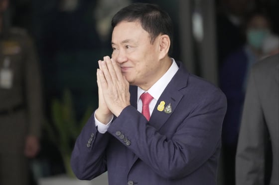 Thailand’s former Prime Minister Thaksin Shinawatra had his sentence reduced to 1-year. Photo: AP