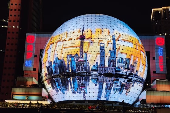 A promotional video for the CIIE is displayed on the world’s first naked-eye 3D spherical screen in Xujiahui Metro City in Shanghai. The expo will be held in the city from November 5 to 10. Photo: Imagine China