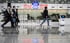 Employees walk through a lobby at Baidu’s headquarters in Beijing on Thursday, March 4, 2021. Photo: Bloomberg