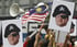 Protesters demonstrating against alleged corruption at 1MDB with portraits of Jho Low in Kuala Lumpur, Malaysia. Photo: AP