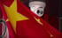A Chinese flag hangs near a Hikvision security camera outside a shop in Beijing. It is among companies blacklisted by the US over treatment of China's Muslim minority groups. Photo: Associated Press