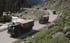 Indian army vehicles move along a highway leading to Ladakh. Photo: APA