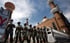 Chinese paramilitary police in riot gear outside a mosque in Urumqi, the capital of Xinjiang. Photo: Reuters