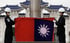 Taiwanese honour guards fold the island’s flag during a flag-lowering ceremony in Taipei in June. Photo: EPA-EFE