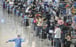 Arrivals at Hong Kong’s airport queue to be sent to their hotels for quarantine. Photo: Sam Tsang