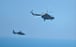 PLA military helicopters fly past Pingtan island in Fujian province - one of mainland China’s closest points to Taiwan - on Thursday. Photo: AFP