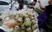 A vendor sells food packed in plastic bags in Bangkok in June 2018. Photo: AFP