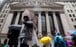 Pedestrians pass the New York Stock Exchange (NYSE) in New York, US, on January 3, 2023. Photo: Bloomberg