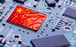 The Chinese flag is seen on a GPU chip attached to a motherboard in this photo illustration. Photo: Shutterstock Images