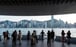 Tourists along the Tsim Sha Tsui promenade during the Lunar New Year holiday in Hong Kong on Febryart 12. Predictions of the death of Hong Kong have surfaced from time and time and proven wrong each time. Photo: Bloomberg