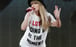 Taylor Swift performs onstage during her Eras tour in 2023 in California. Graphic T-shirts like the one she is wearing here can often pack a political or social punch even when they are not intended to by their designers. Photo: Getty Images