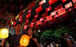 People walk past the Chinese national and Hong Kong flags on October 1, 2023. PhotoL EPA-EFE