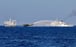 Chinese coastguard vessels fire water cannons towards a Philippine resupply vessel en route to the Second Thomas Shoal, in one of a string of recent confrontations in the South China Sea. Photo: Reuters
