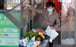 A woman wearing a face mask leaves a supermarket with a loaded shopping trolley in Changsha in China’s Hunan province on January 29. China’s market regulator has vowed to punish businesses engaging in price-gouging. Photo: Reuters