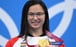 Tokyo Olympics gold medallist Margaret MacNeil, of Canada, after winning the women’s 100m butterfly at the Tokyo Aquatics Centre in Japan. Photo: AFP