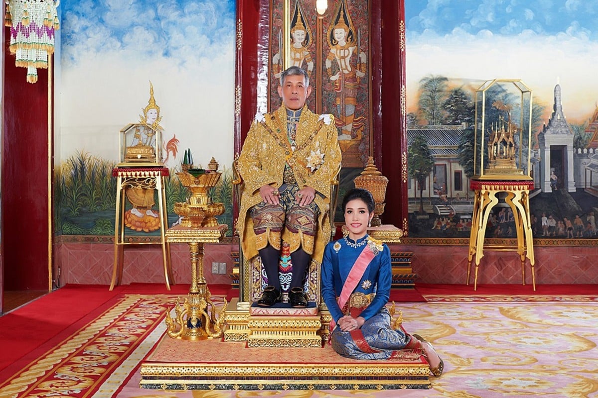 Thailand’s King Maha Vajiralongkorn with royal consort Sineenat Wongvajirap...